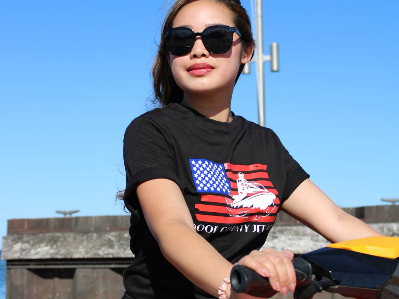 a person sitting on a motorcycle